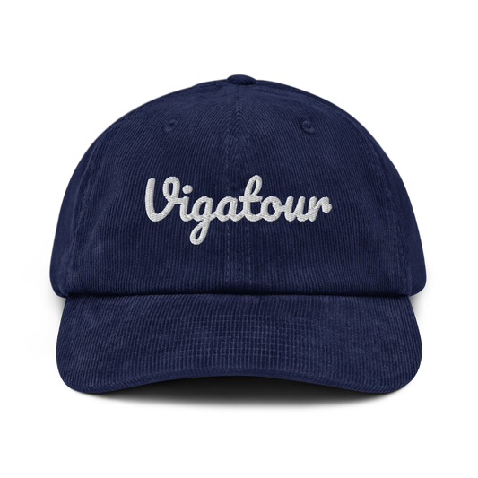 Navy blue cap with 'Vigatour' embroidered on a white background
